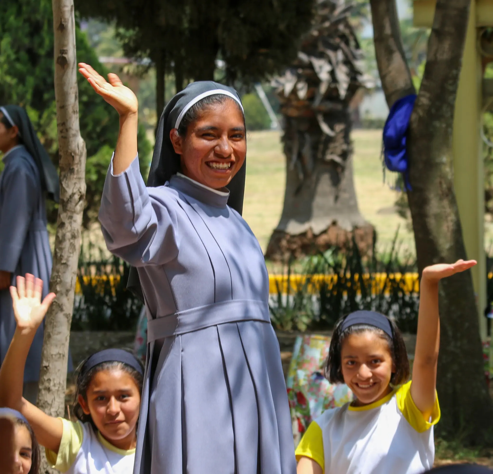A Sister of Mary with the girls at Girlstown